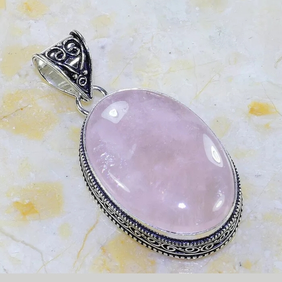 bettybooper61 Jewelry - Rose Quartz pendant